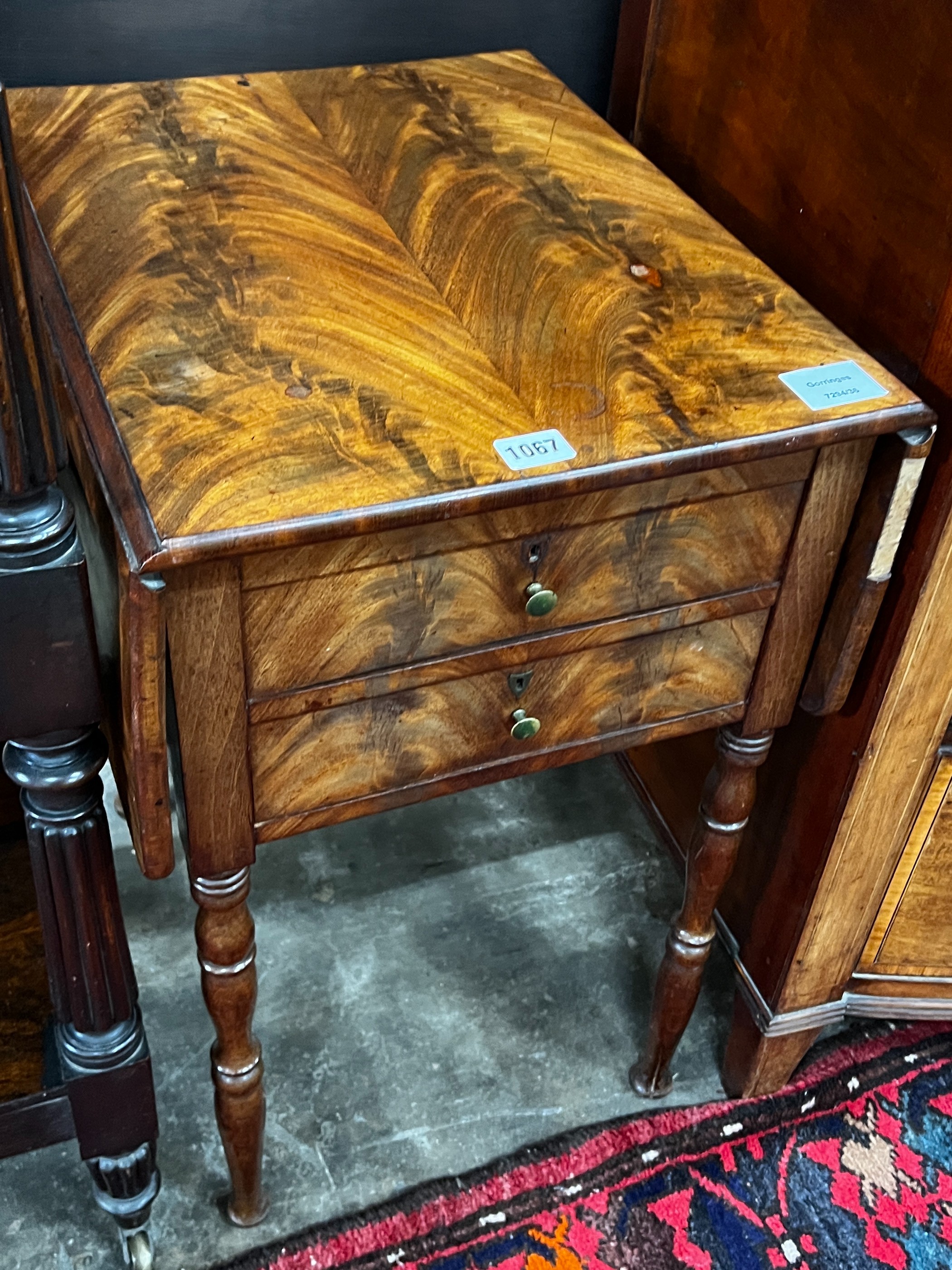 A 19th century French mahogany drop flap work table, width 38cm, depth 47cm, height 63cm